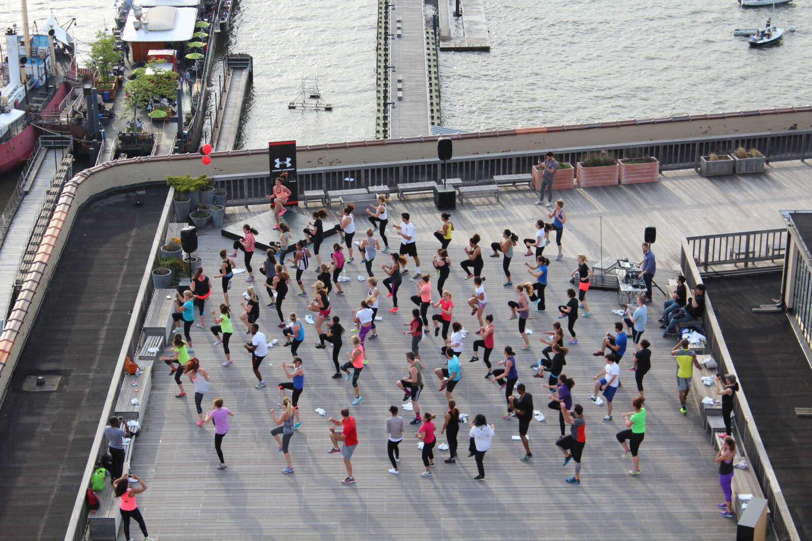 people participating in a fitness class outdoors